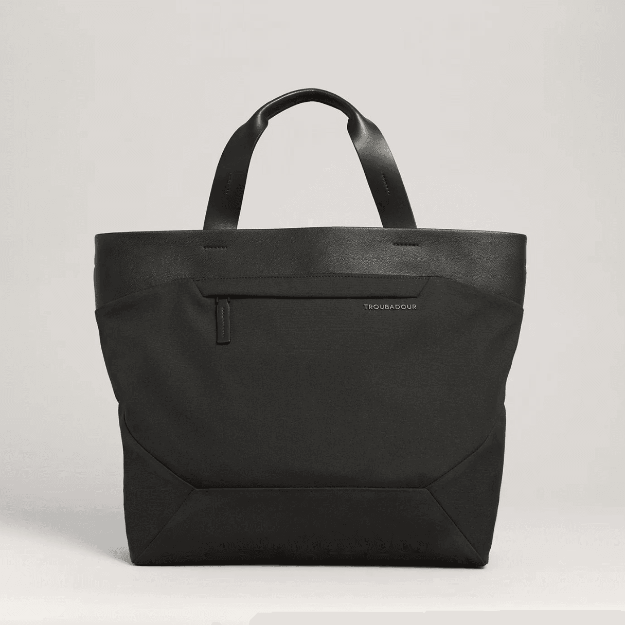 Dark black tote with leather detailing.