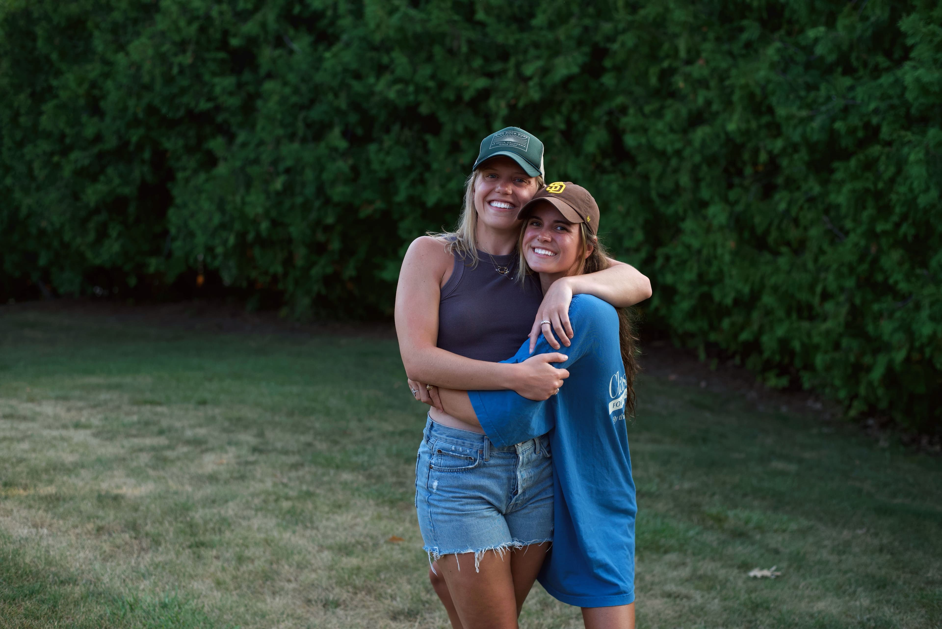 two girls hugging each other