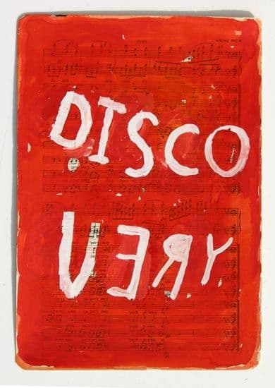 red paint with haphazard words saying "disco very" on top